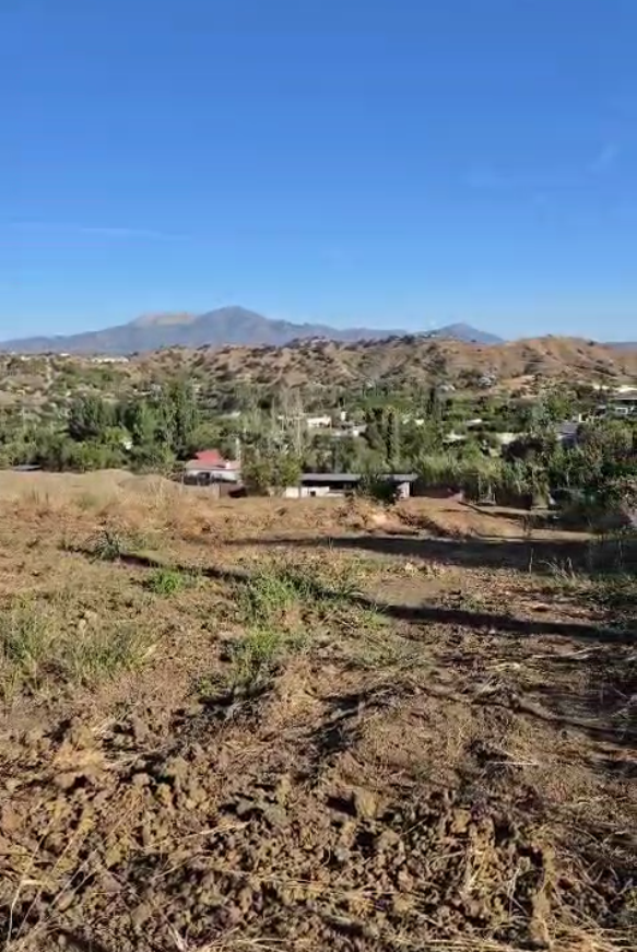 Parcela rustica con una casa registrada para reformar