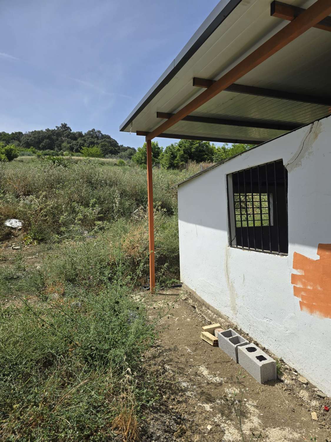 Parcela rustica con una casa registrada para reformar