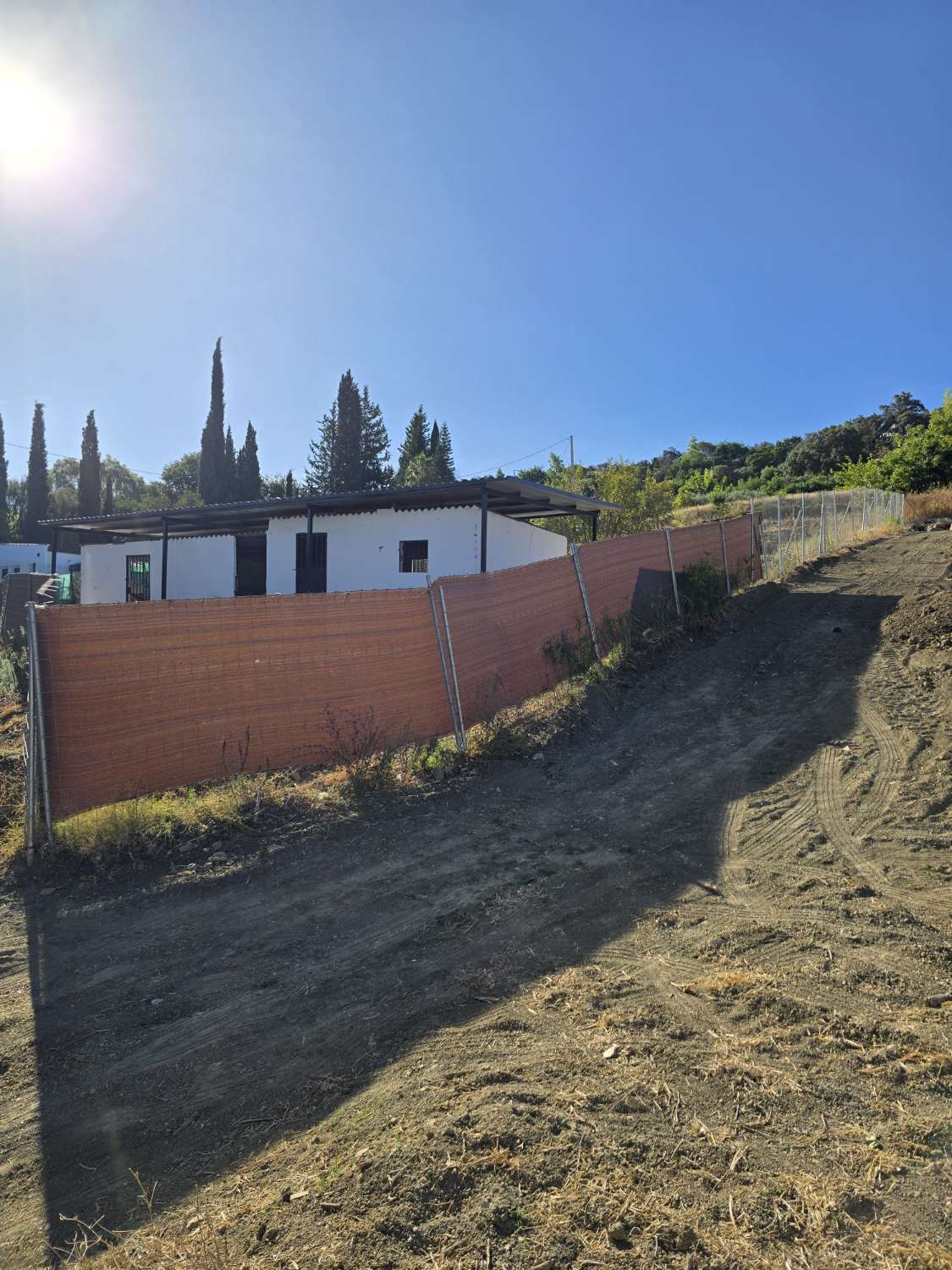 Parcela rustica con una casa registrada para reformar