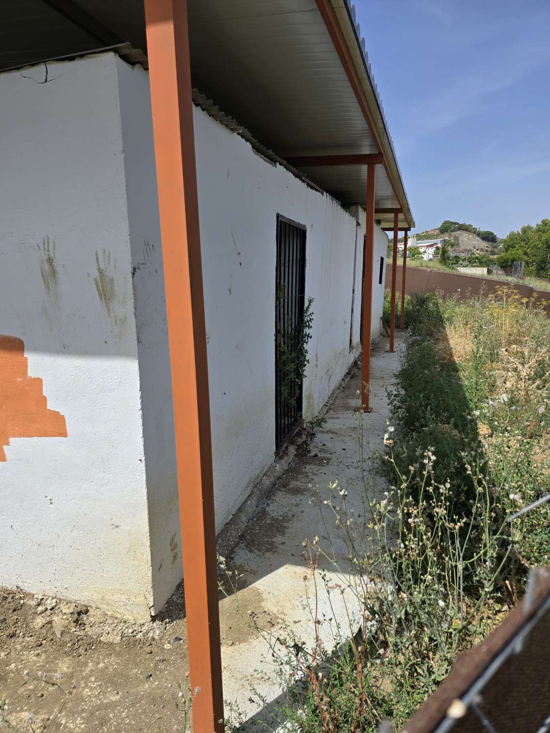 Parcela rustica con una casa registrada para reformar