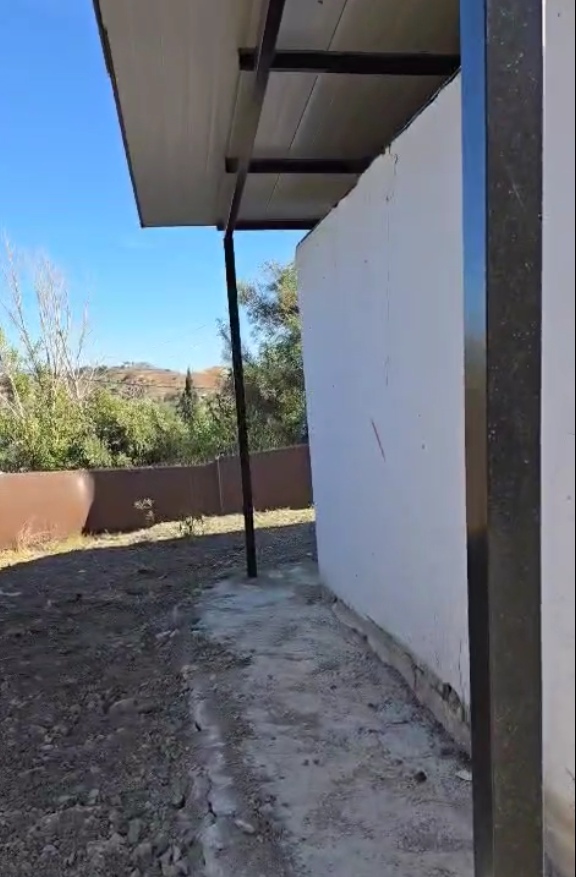 Parcela rustica con una casa registrada para reformar