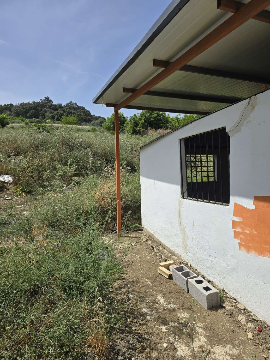 Parcela rustica con una casa registrada para reformar